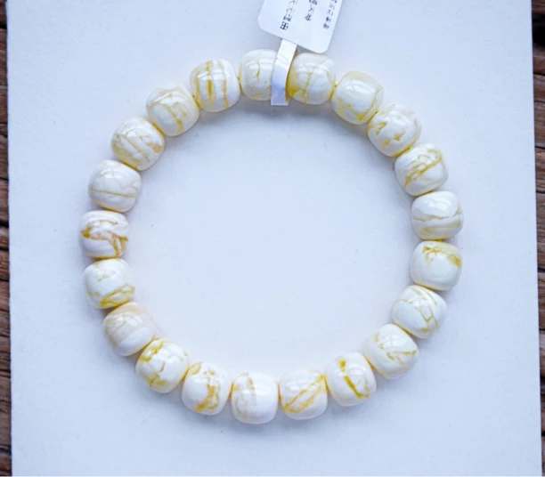 同料10x9.2mm俄料瓷白虎皮花蜡老型手串12.76克精工高桩蜜蜡手串