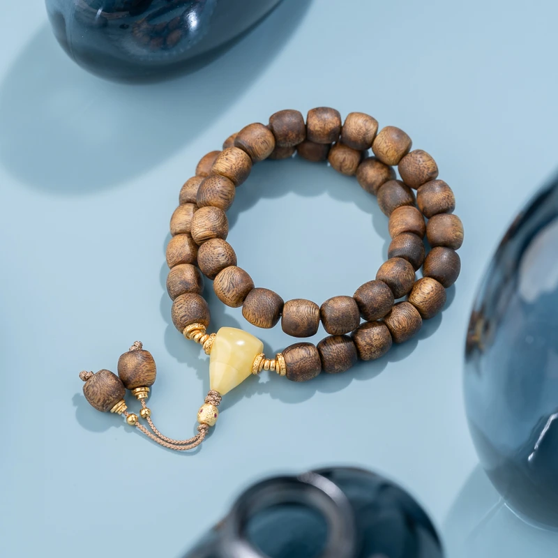 沉香金丝油奇楠沉香9*10mm鼓珠双圈手串