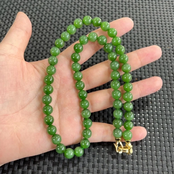 【高色冰底辣绿荧光猫无矿点】俄7老料碧玉约8mm56颗