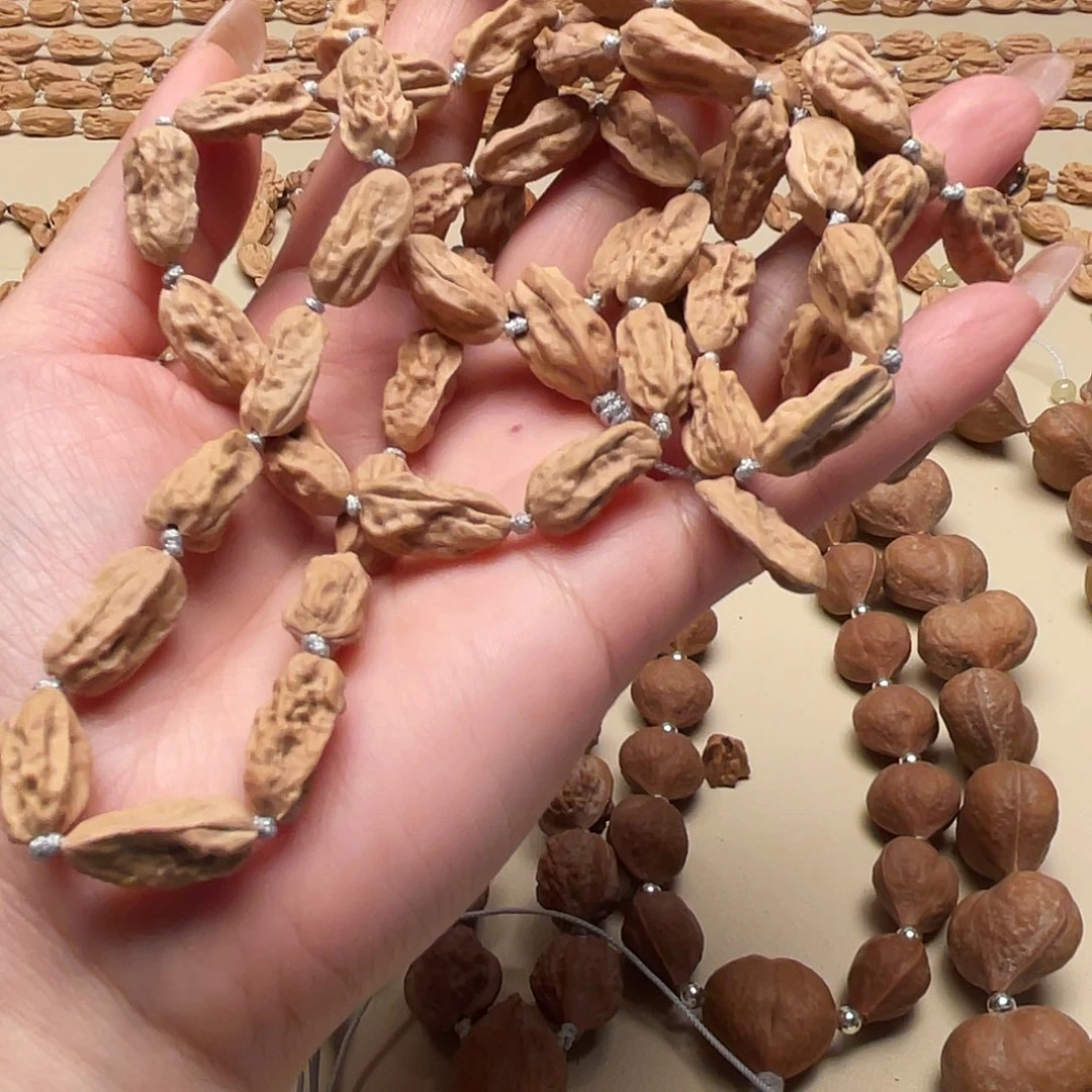 熹***吧手串桃核异形脖挂