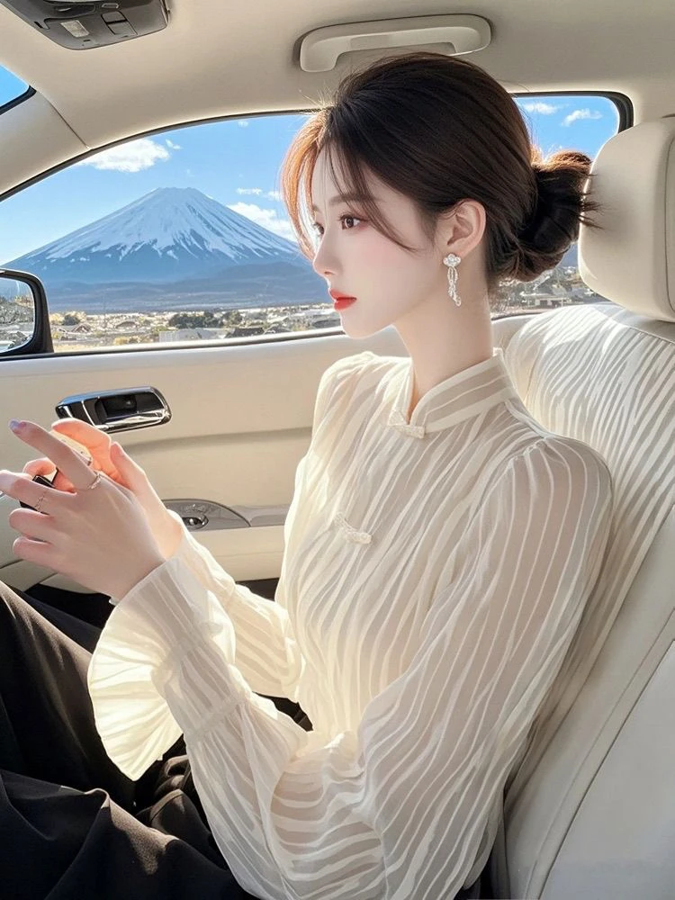 今年流行超好看白色条纹衬衫女2025早春新款中式国风盘扣遮肉小衫