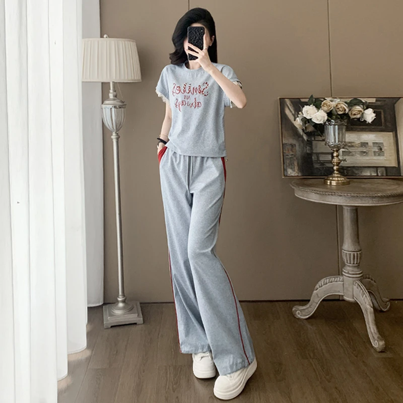 韩系时尚休闲运动套装女夏季新款钉珠蕾丝花边短袖上衣长裤两件套