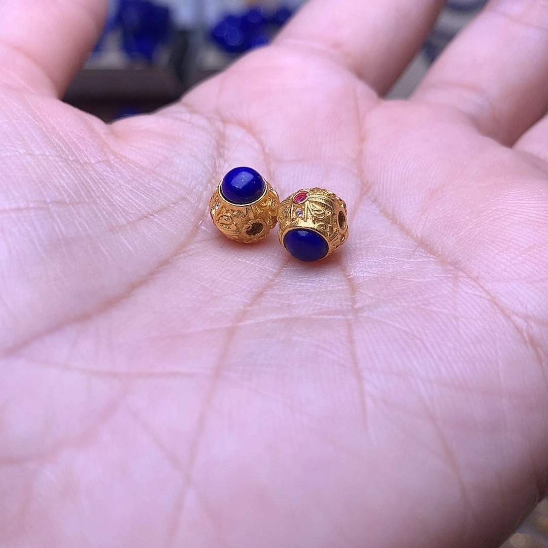 蜡***新青金石银S925镶嵌隔珠背云