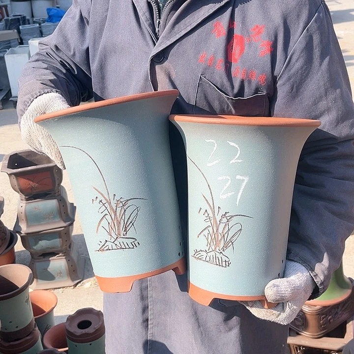 紫砂紫砂花盆和茶树精油也