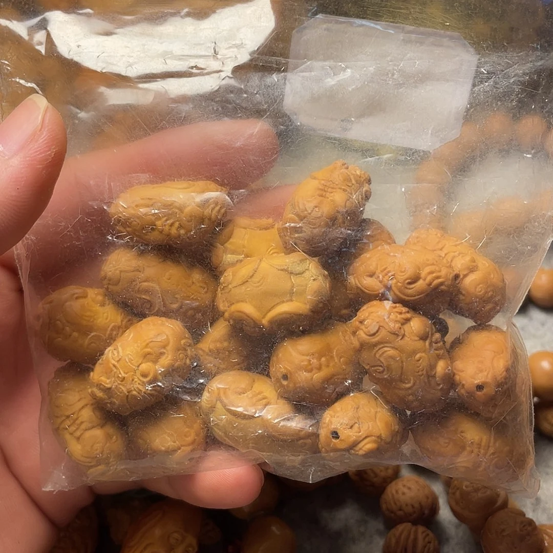 橄榄核雕刻皮裘单籽