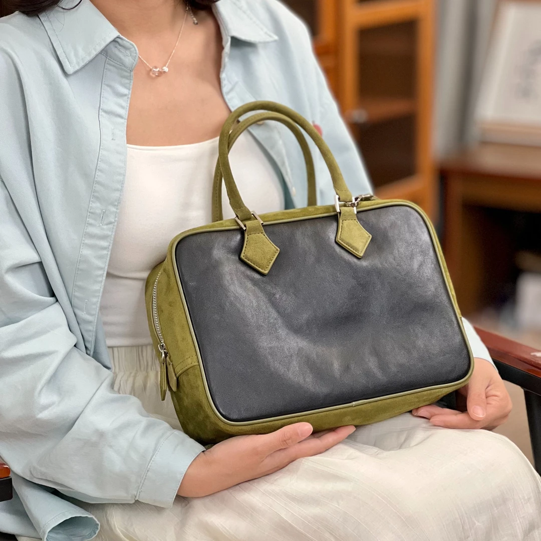 【挪威森林】知女新款撞色大容量时尚羽毛包手提单肩斜挎女包