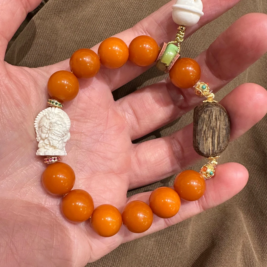 S12524<晶贵坊>S925银蜜蜡猛犸扎基牛骨铃铛松石随型香香弹力手串