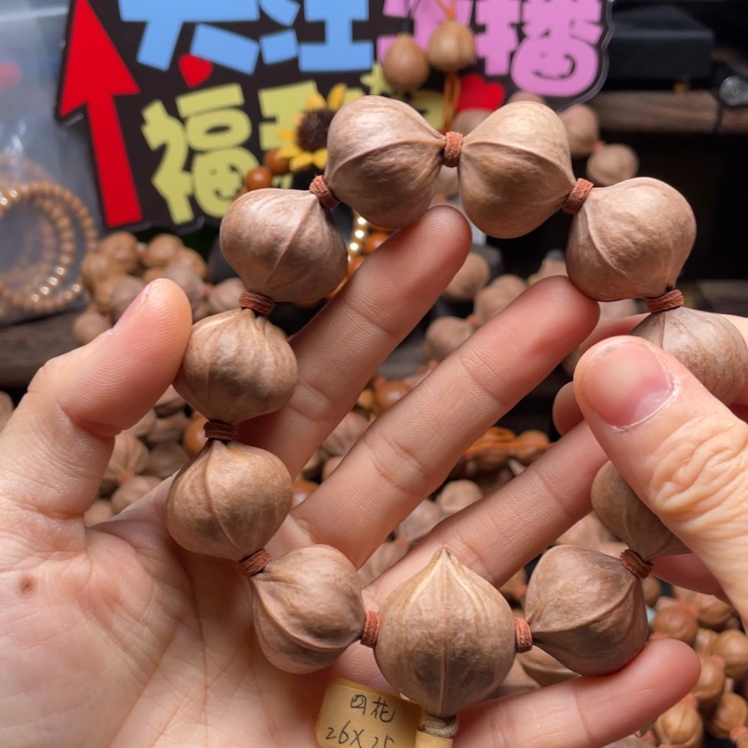 T***t橄榄核吊坠2625四花铁核