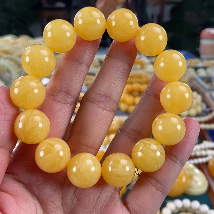 琥珀未镶嵌珠宝奇石16同料鸡油黄虎皮圆珠33.31
