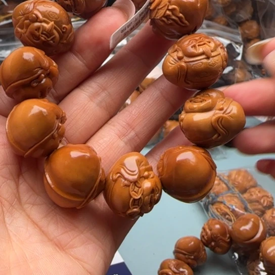 修***缘橄榄核手串橄榄雕工艺的