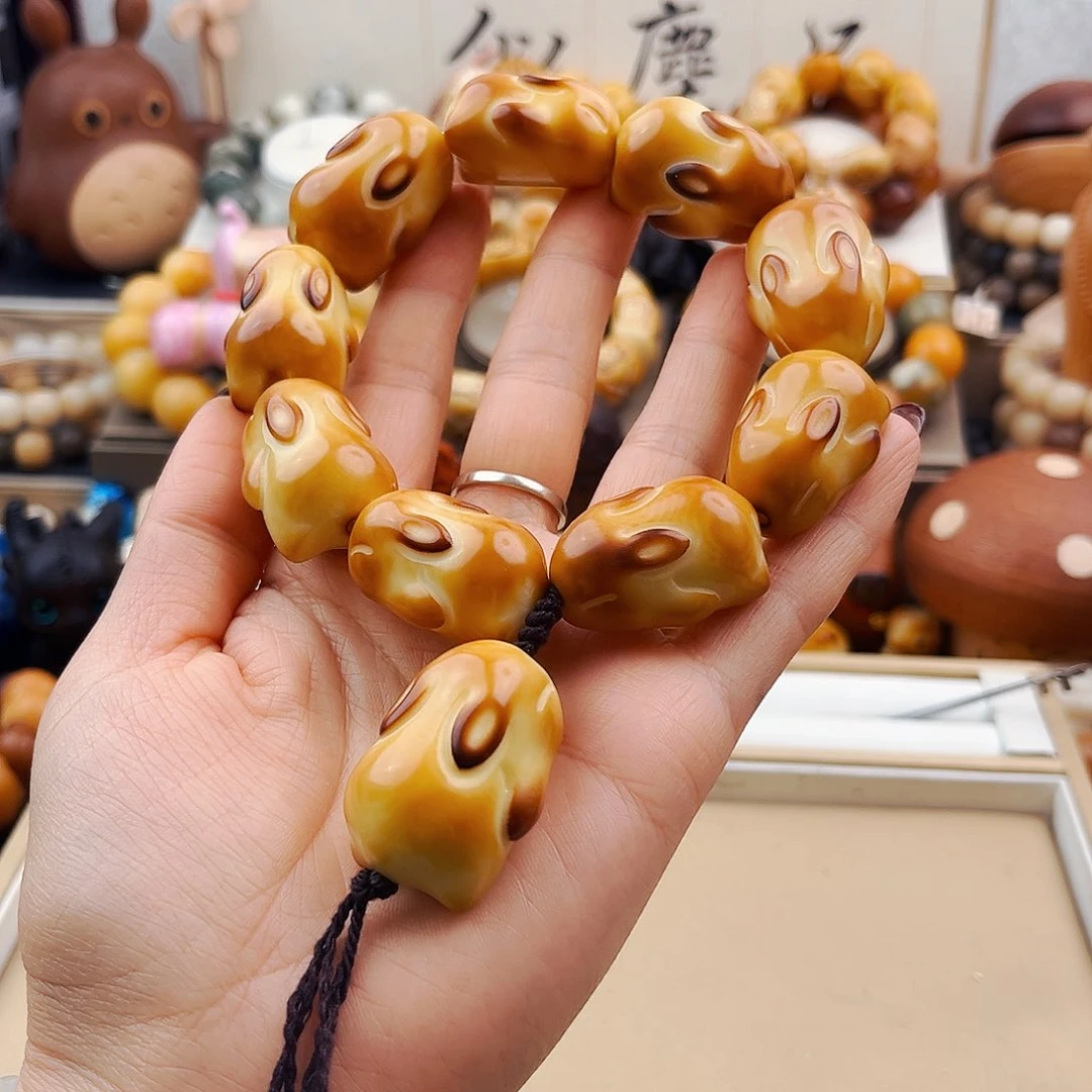 菩提根/象牙果手串?**?蓝珀专拍