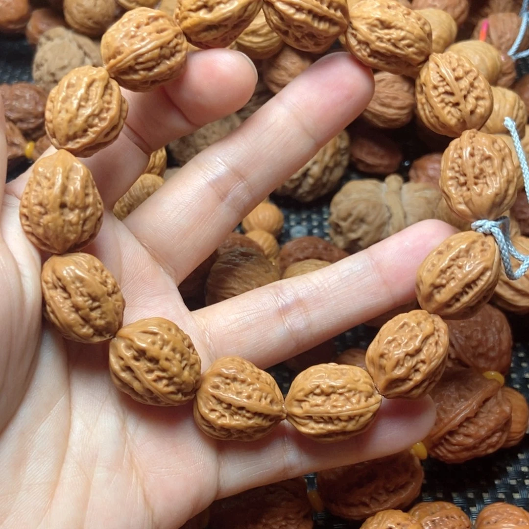 小***丑桃核吊坠金刚纹手串