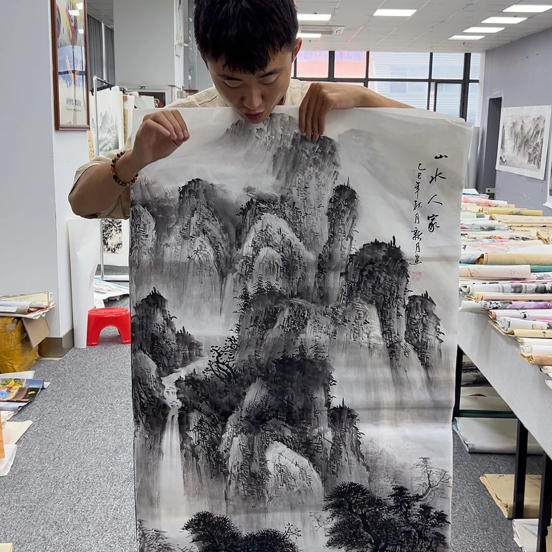 国画卖字画的小男孩