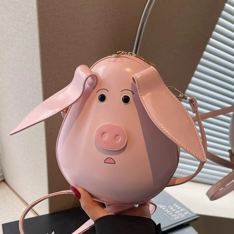 可爱粉色小猪手机包女2025新款韩版百搭斜挎包夏季小众设计通勤包
