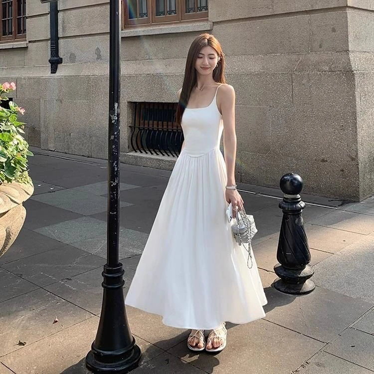 温柔夏季长裙白裙白色裙子法式显瘦收腰气质新款吊带连衣裙
