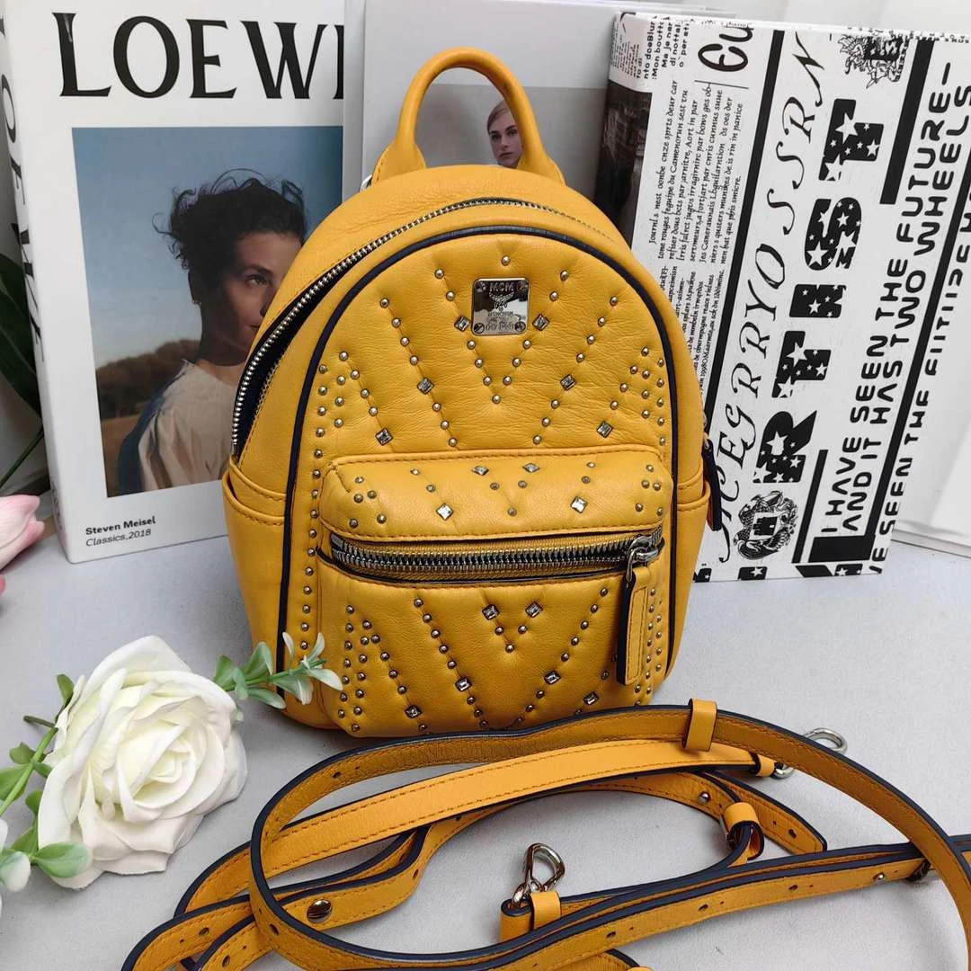95新 MCM MCM 双肩包mini黄色 11909404女包