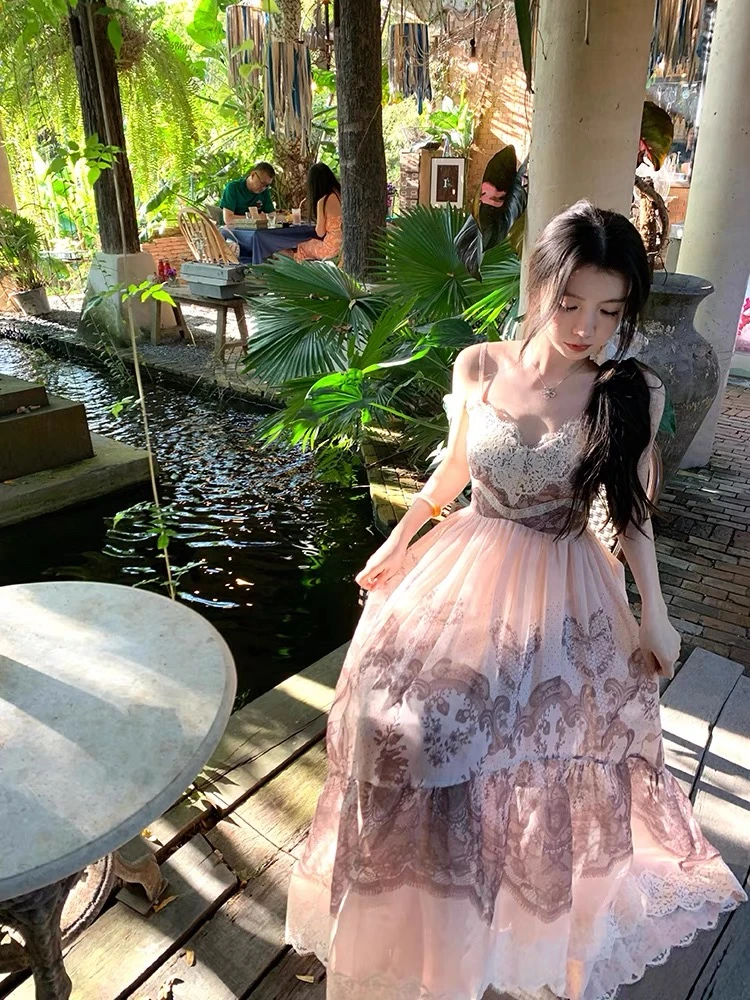 【落日繁花】定位印花蕾丝不规则吊带长裙海边度假风显瘦气质连衣裙