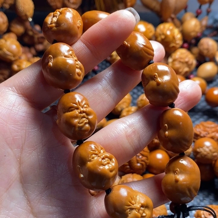 吊坠橄榄核人****苏人生百态