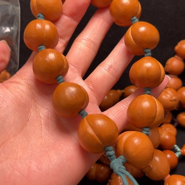 天***恒橄榄核吊坠屁桃21