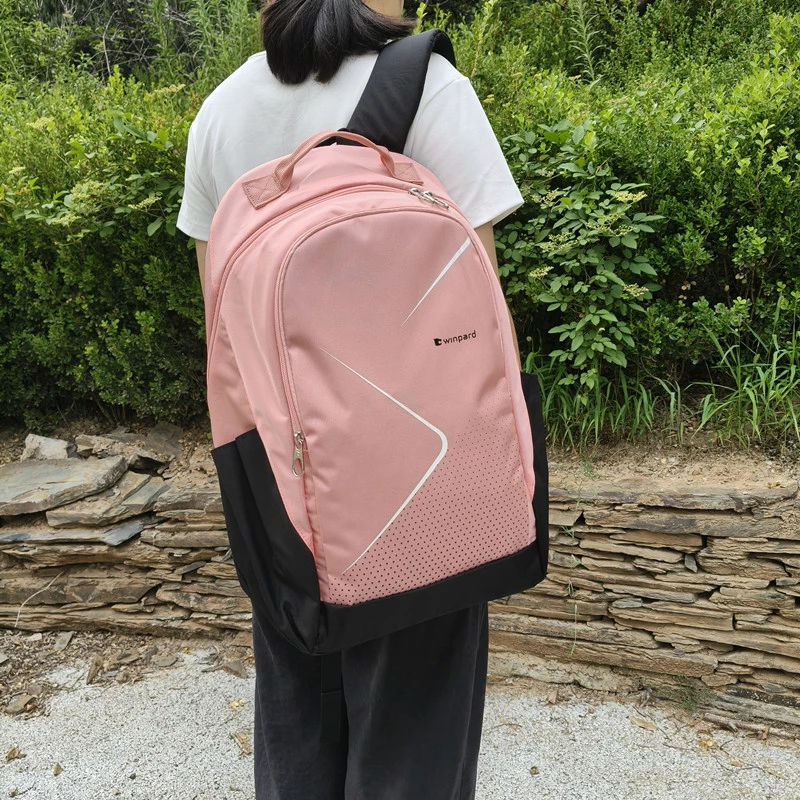 威豹双肩背包手提肩挎素学生包商务旅行包潮流时尚动感元防雨新款