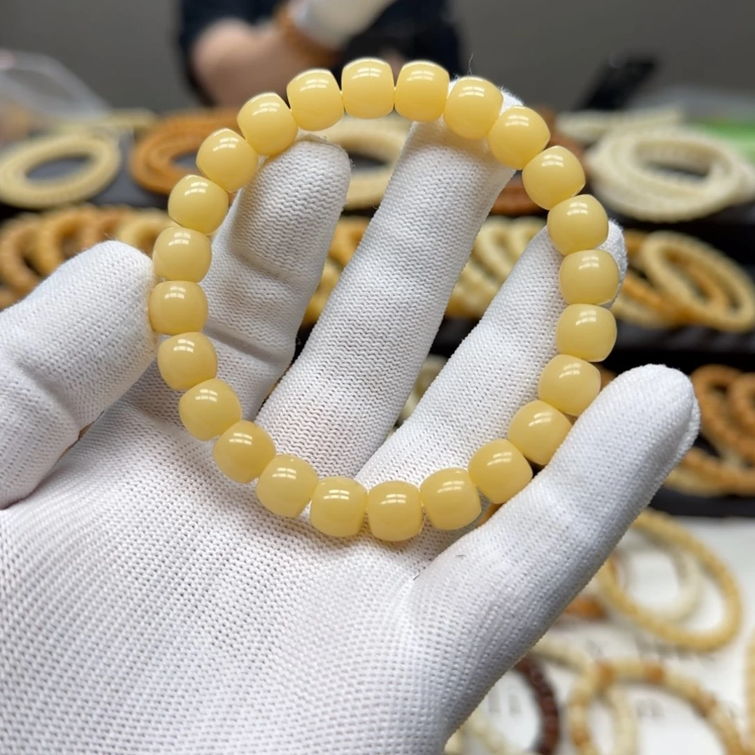 茆***哥菩提根/象牙果手串9×10 鼓珠 10年 柠檬透 鬼工