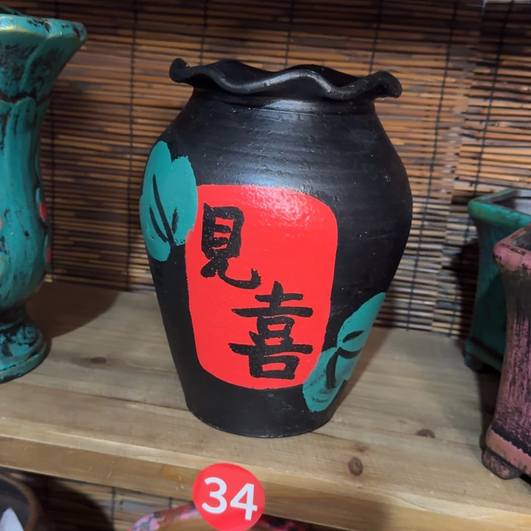 红陶浮雕花盆炸炸炸