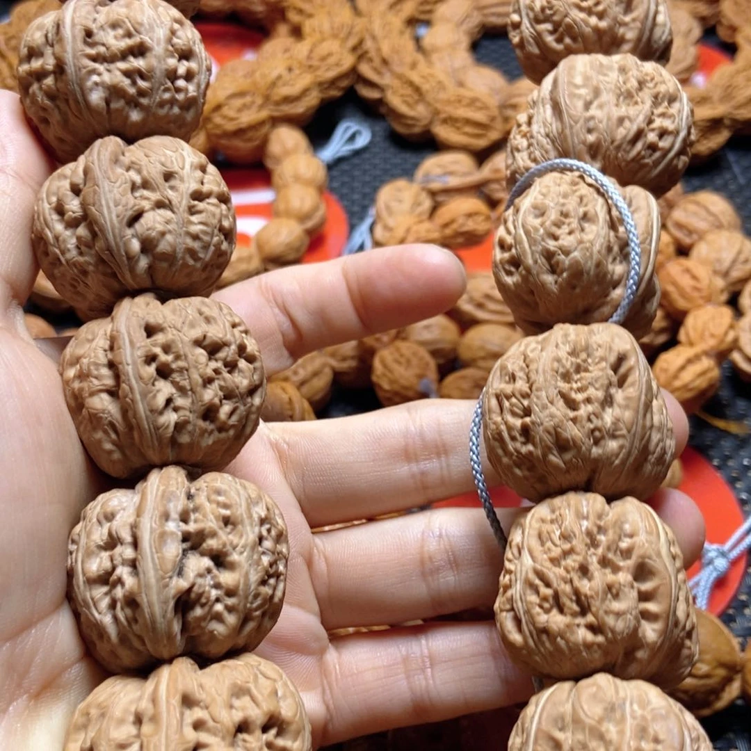 文玩核桃手串是**～元宝手持