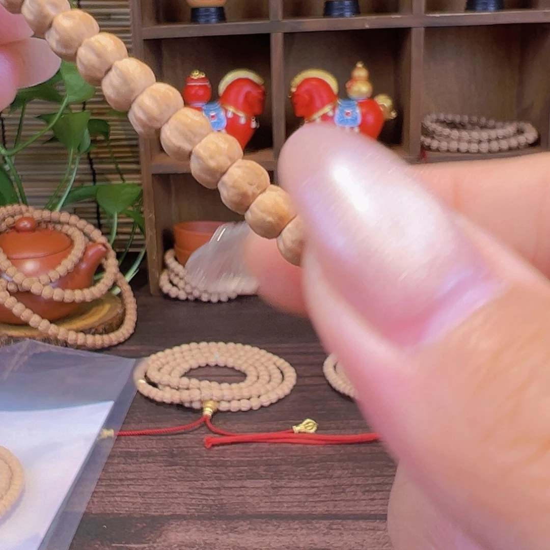 骑***托柏香籽/百香籽吊坠