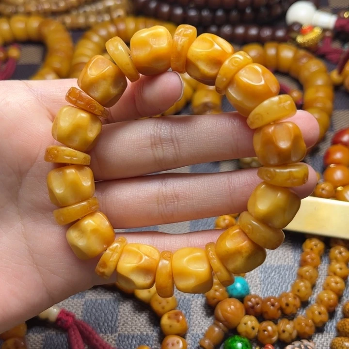 藏区牛牛材质手持
