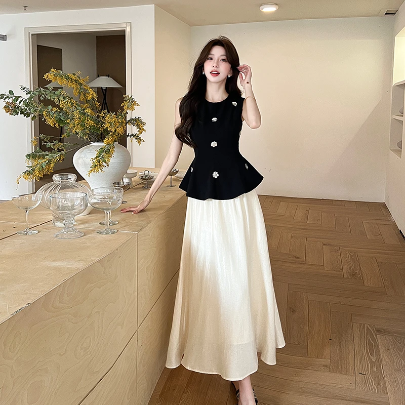 千金感无袖黑色背心修身气质收腰上衣春季新款半身裙两件套女