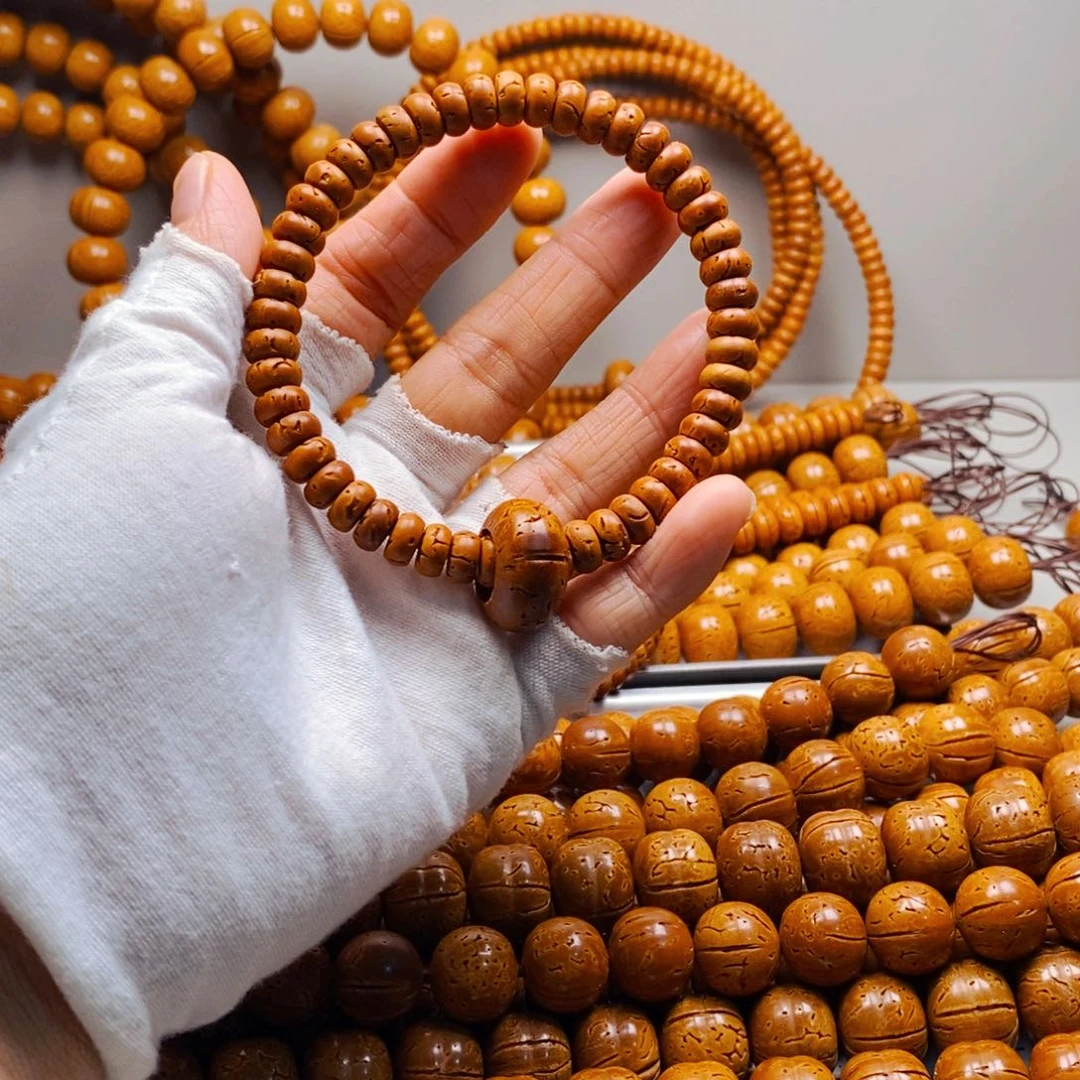 桃核手串4乘8核片手串轻色28加米