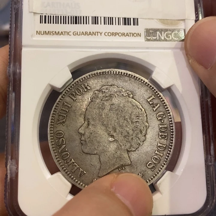 狼***8银Ag900G22-如图一个银纪念币