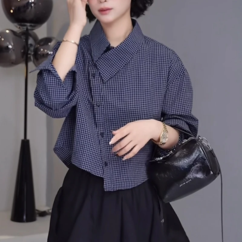 条纹衬衫女士2025新款春季休闲显瘦洋气减龄设计感不规则气质上衣