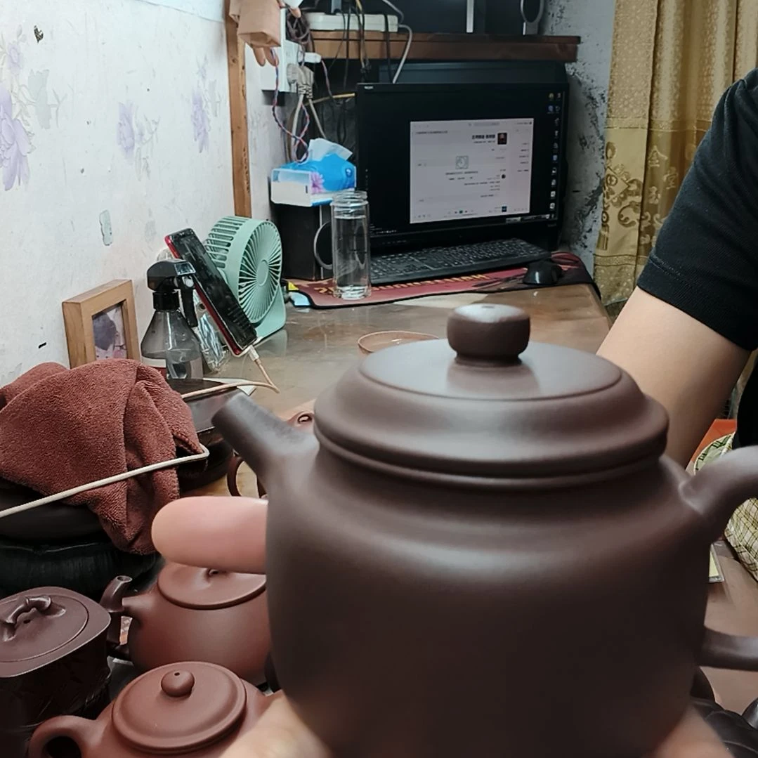 茶壶紫砂人多力量大可以可以