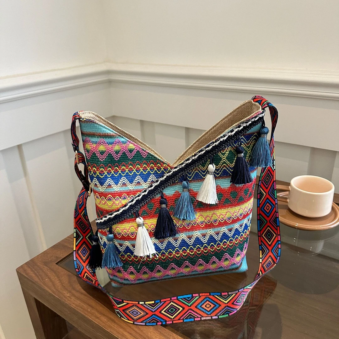 2024夏季新款潮时尚简约休闲女单肩包文艺国风流苏包大容量托特包