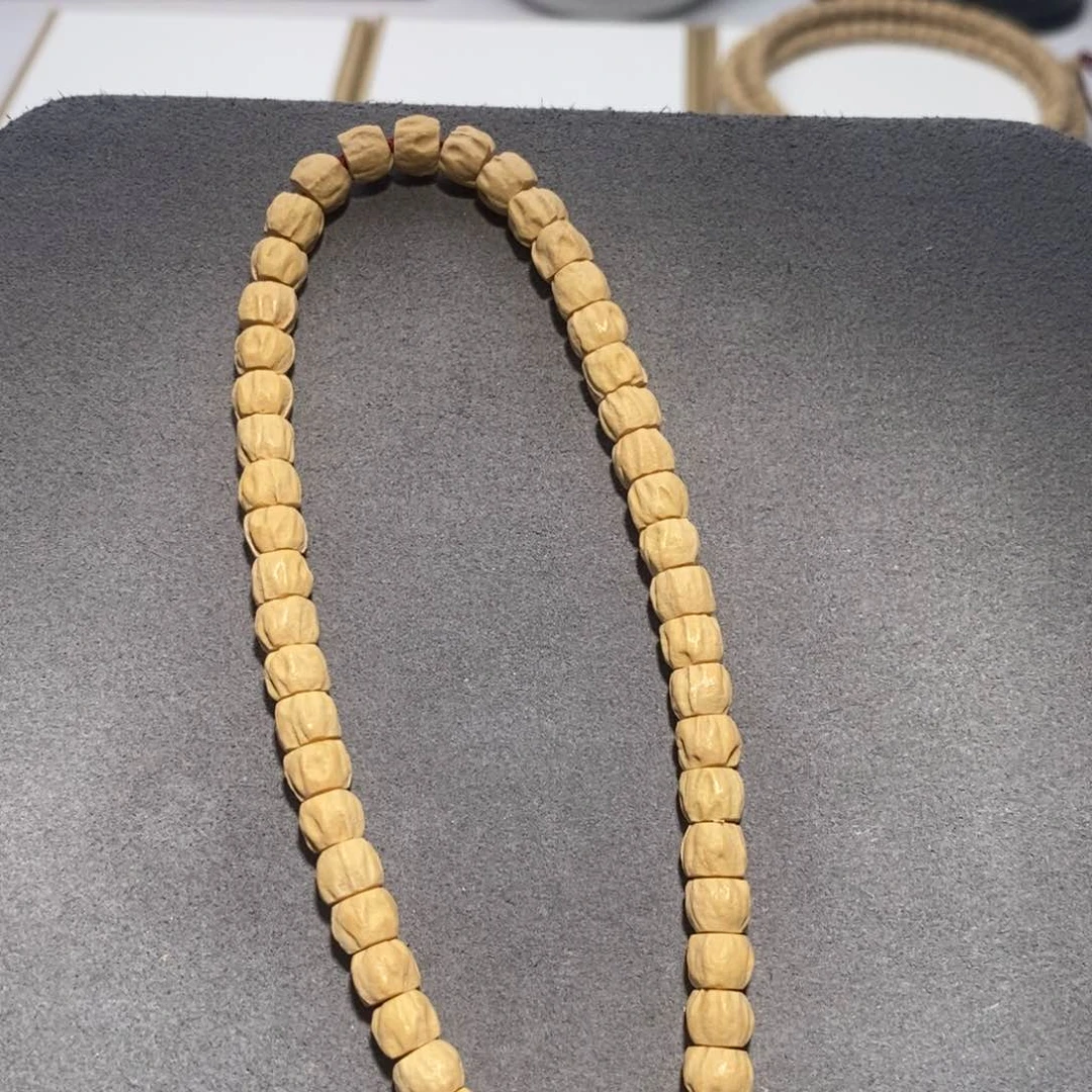 柏香籽/百香籽吊坠缱*?手持