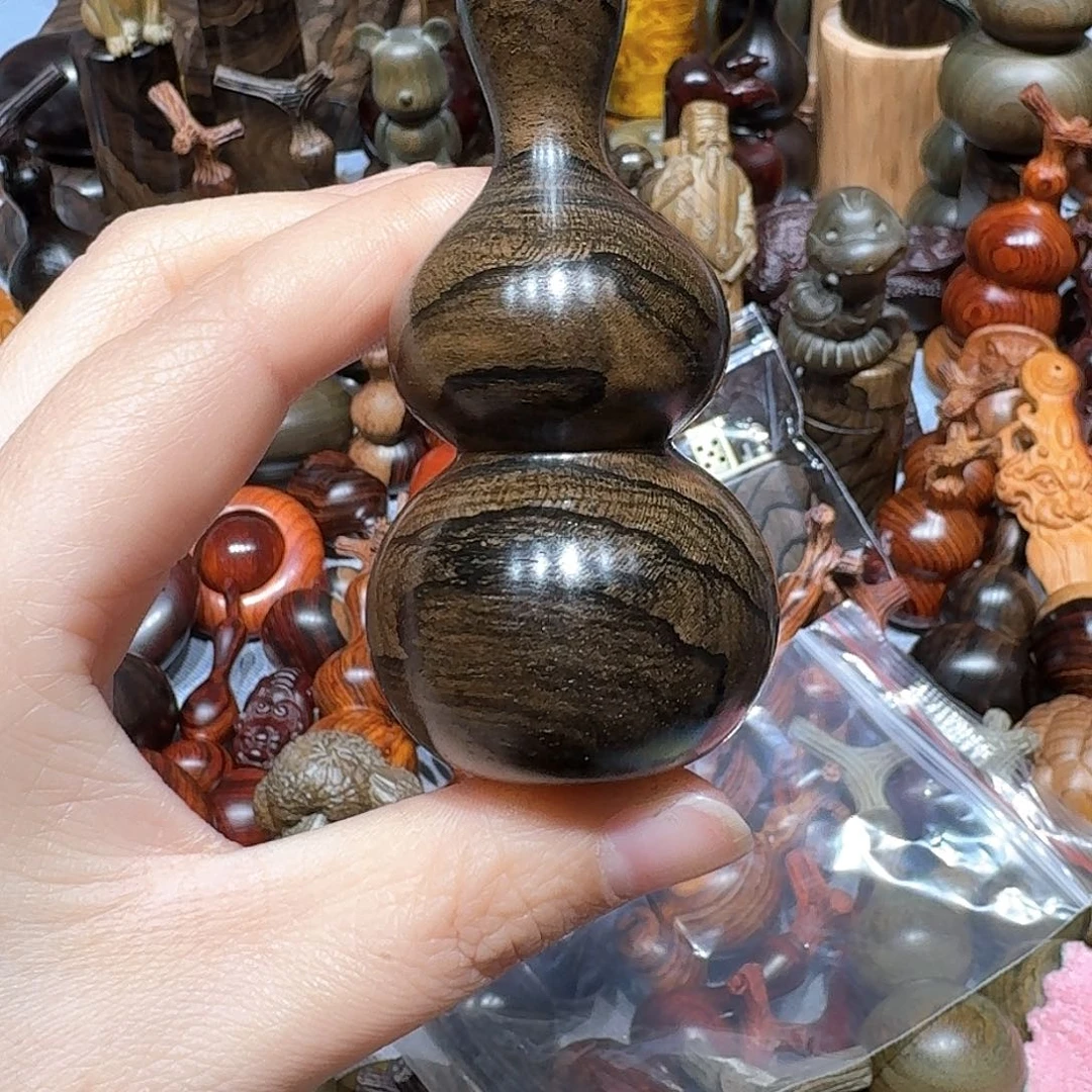 香榧木袁****站墨西哥黑柿木