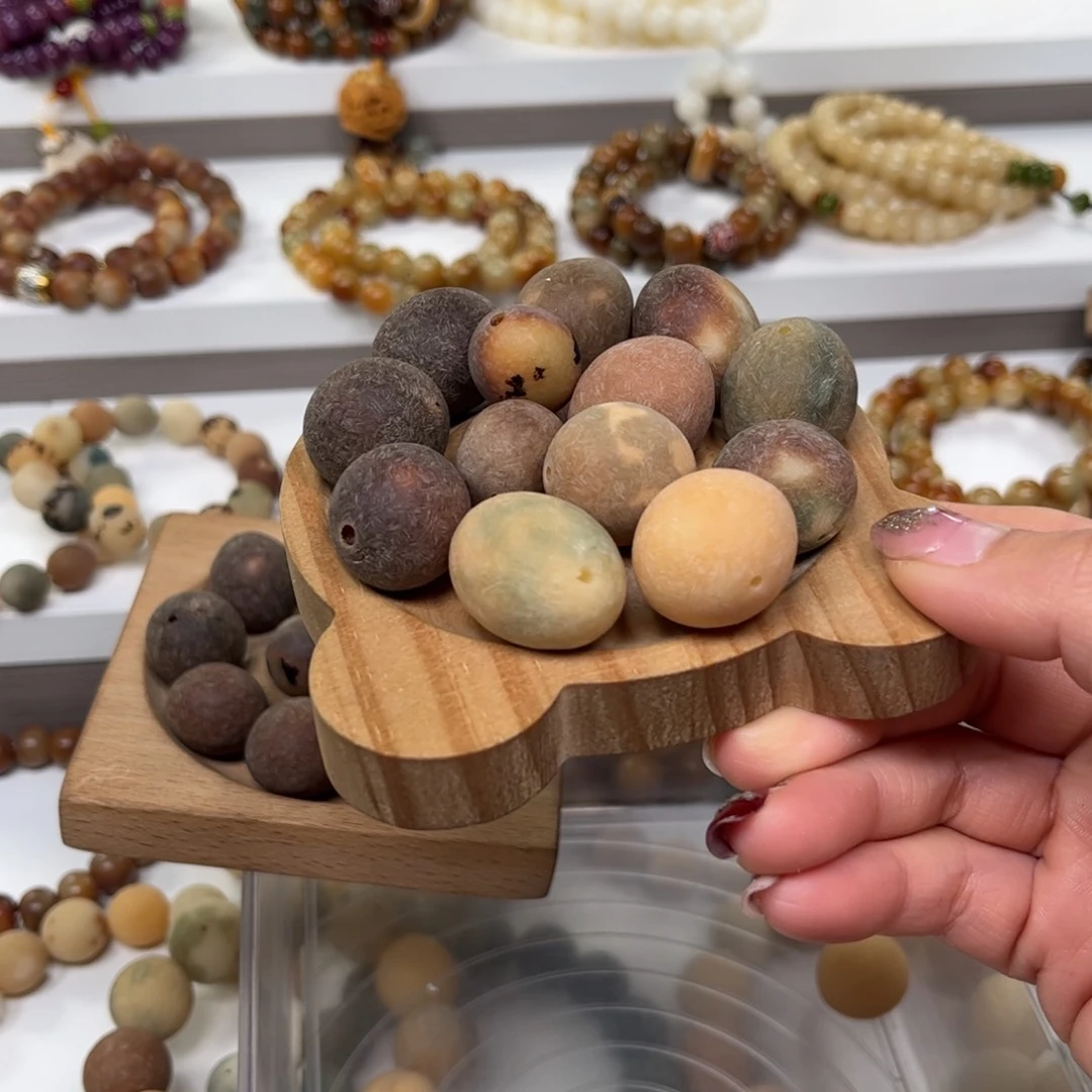 白玉菩提手串中*藏歪孔原籽11颗