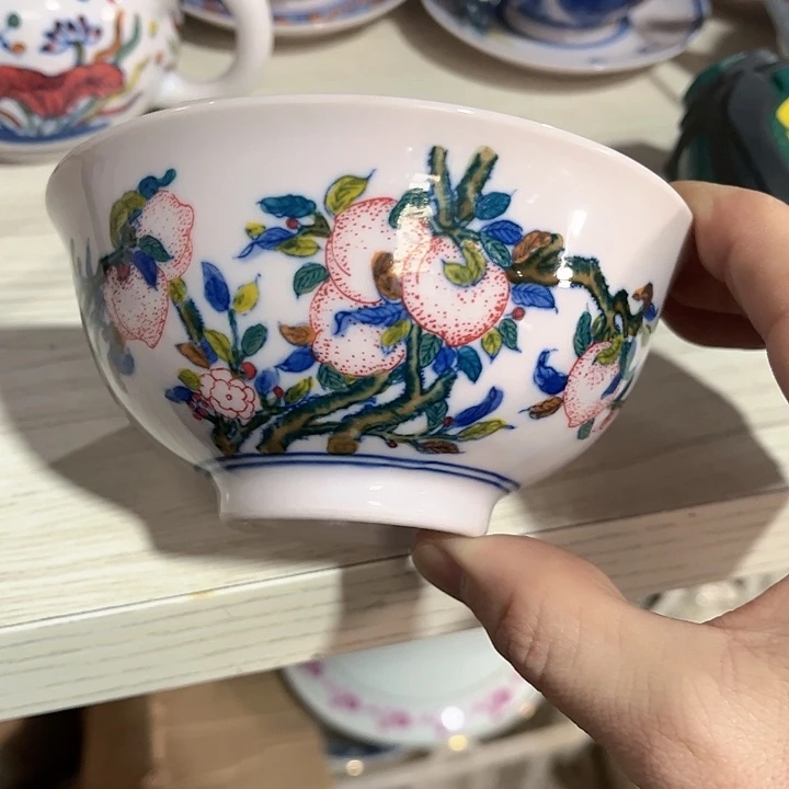 瓷片/////直径12.5厘米。红。