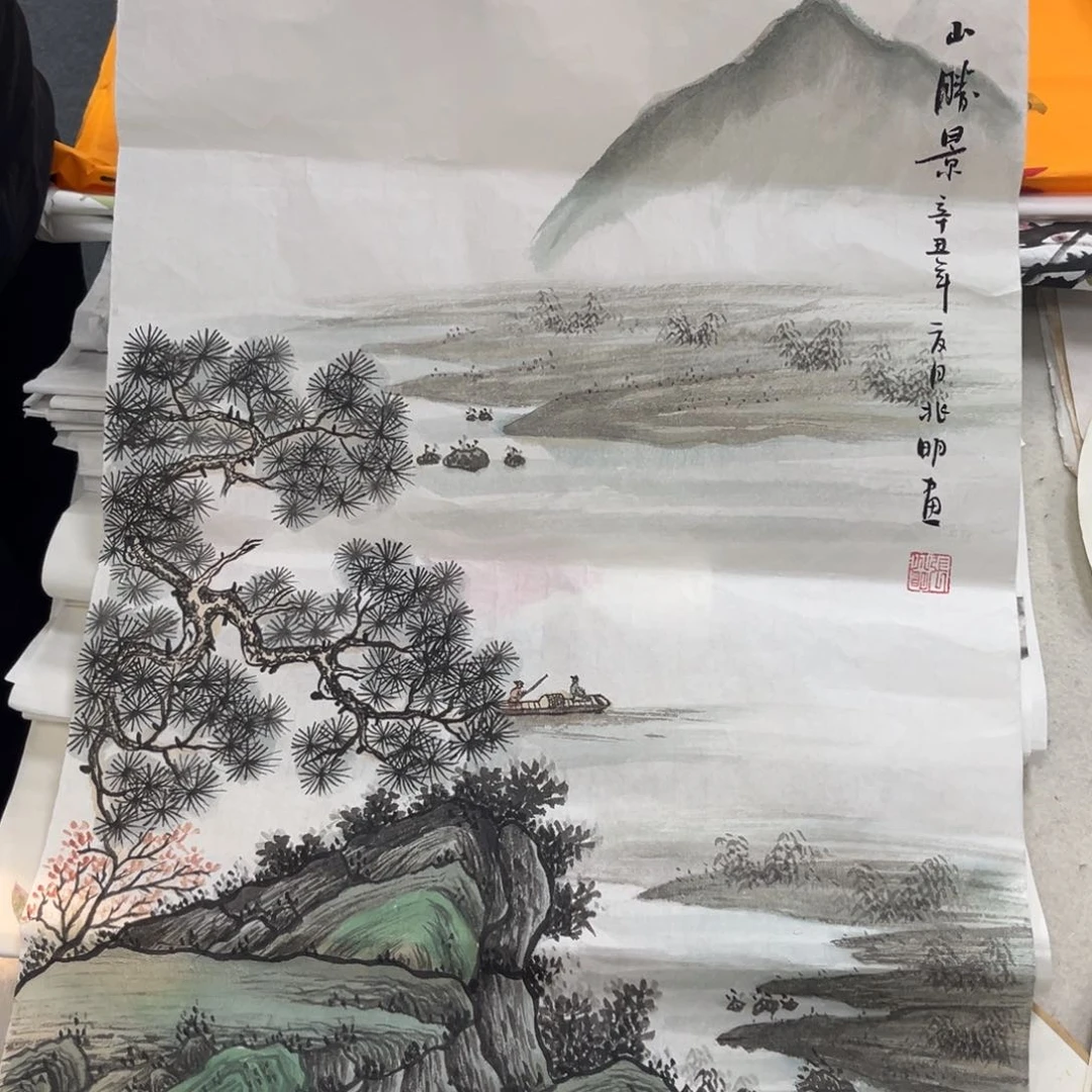 国画卖字画的小男孩