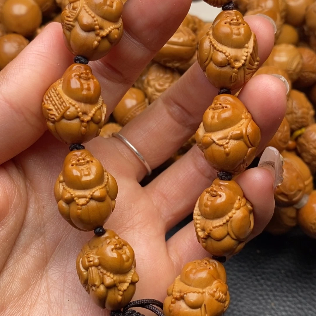 橄榄核手串开心米勒