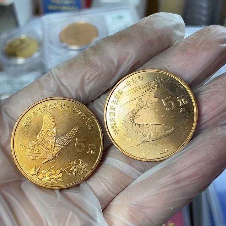 其他普通金属微氧化动物币一对。008