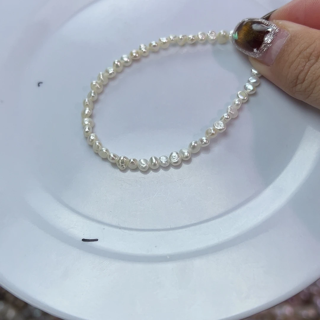 手绳淡水珍珠钛钢