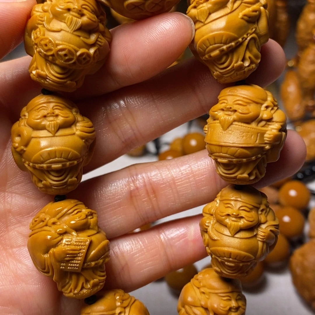 橄榄核手串腰缠万贯财神