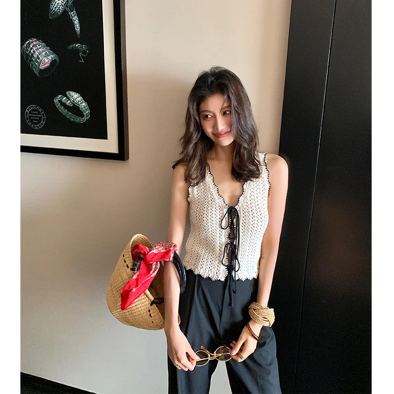 【ALONE SAVOR】龍喜儿柔雾自然系度假风镂空绑带山羊绒马甲J523