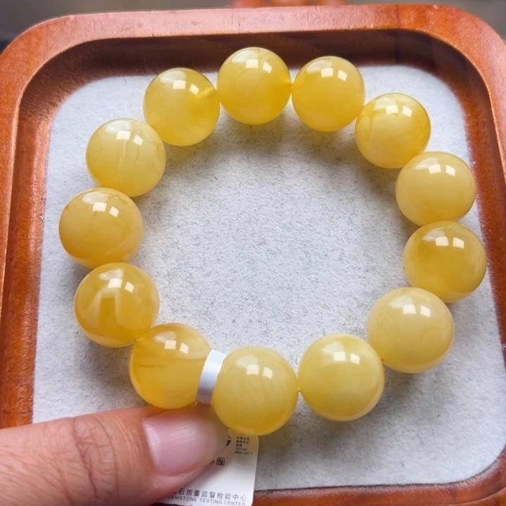 裸石琥珀未镶嵌M248号16+鸡油黄妖花