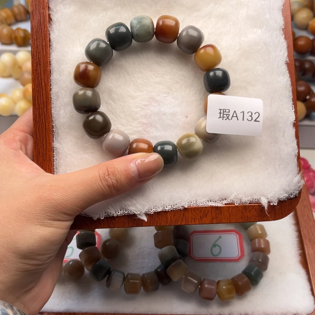 菩提根/象牙果手串李****行12mm桶珠一串瑕A132