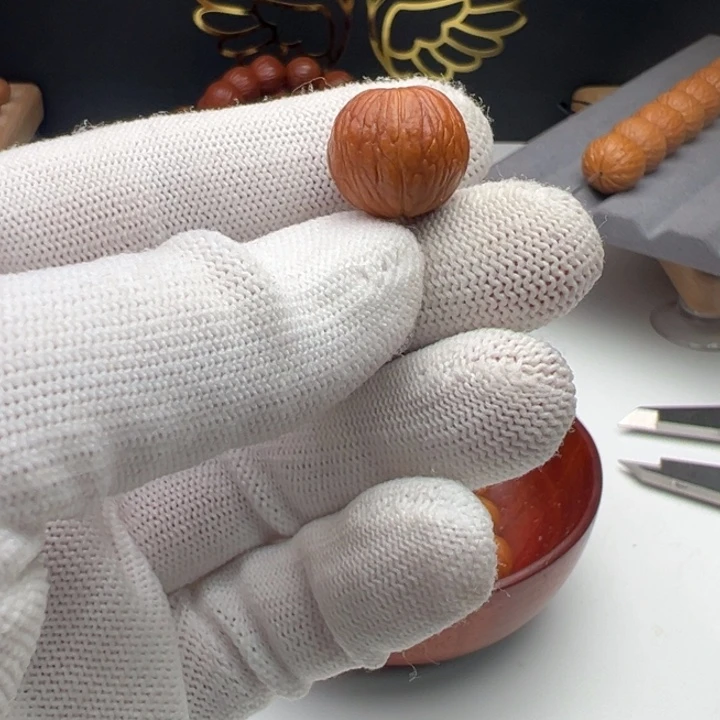 万****猴头核桃吊坠三通