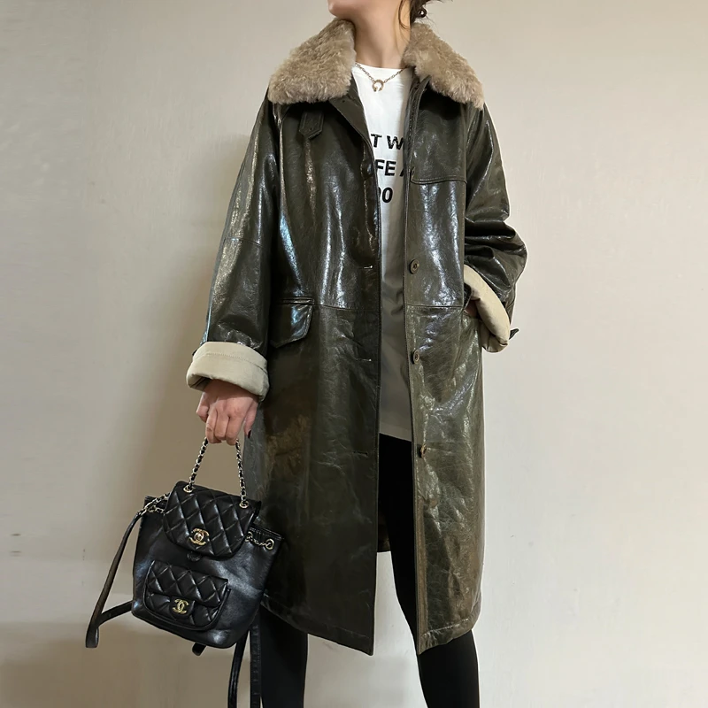 卡嫚喆 2025冬新款进口油蜡羊皮加厚鹅绒宽松版真皮长款风衣外套