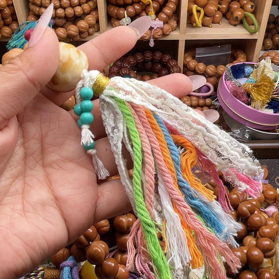 手串猴头核桃蕾丝粉色流苏